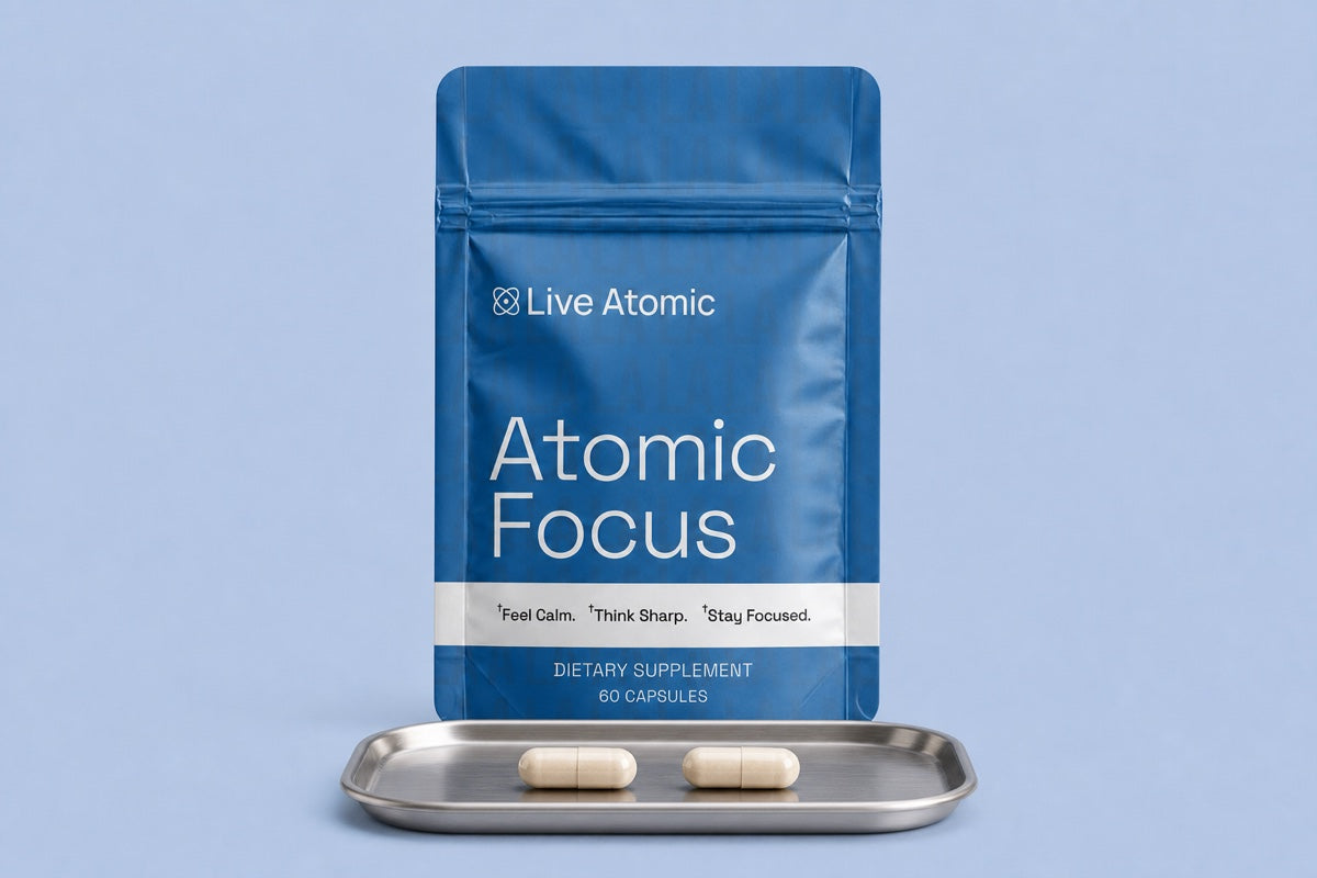Atomic Focus pouch with two capsules on a laboratory dosing tray